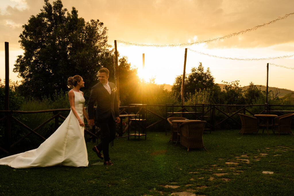 London destination wedding photographer capturing the sunset in Assisi,Italy at Costello Petrata wedding venue.