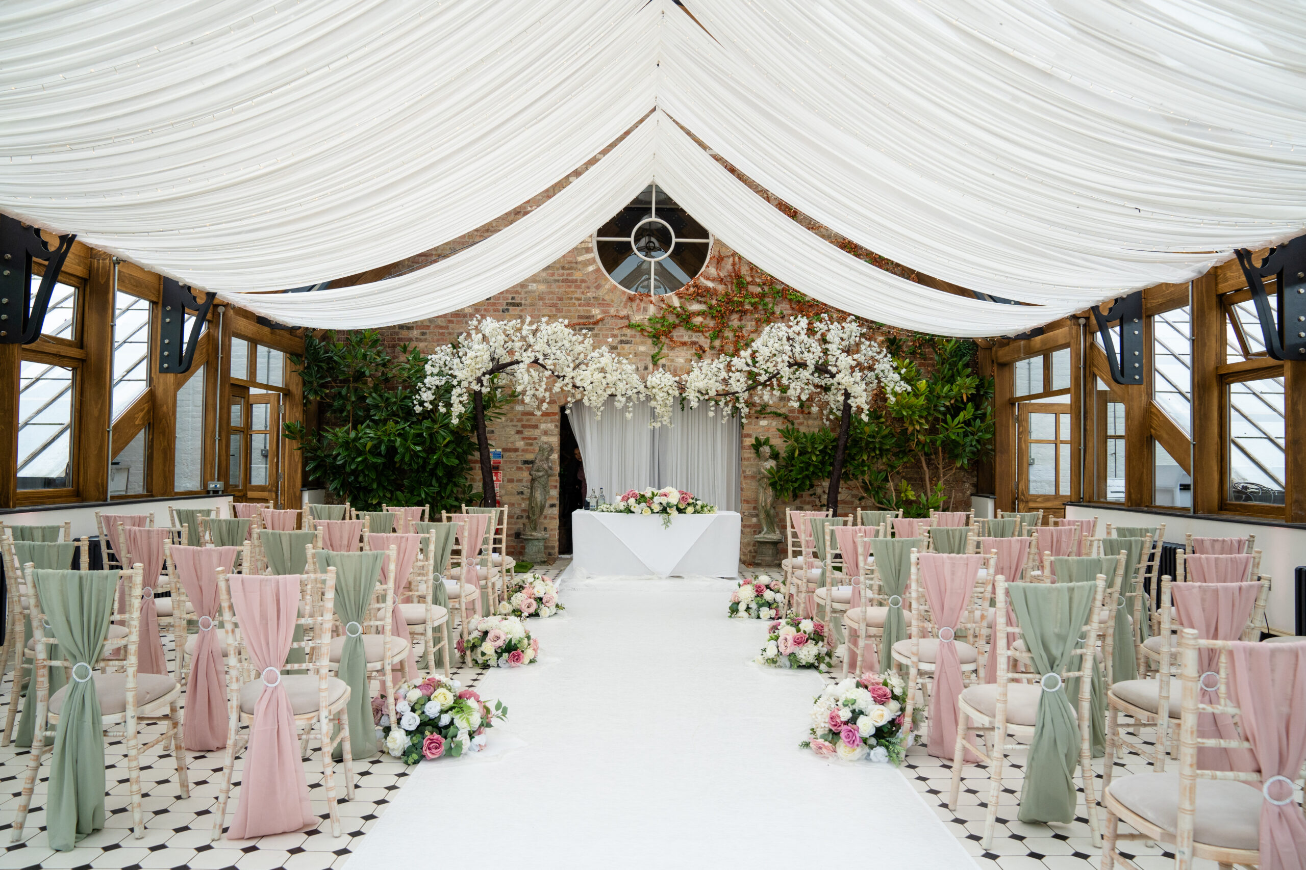 Garden Court beautifully decorated at Hanbury Manor wedding venue