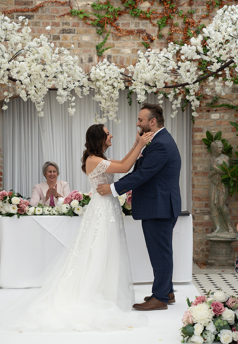 Ceremony portrait in Hanbury Manor wedding venue in Hertfordshire