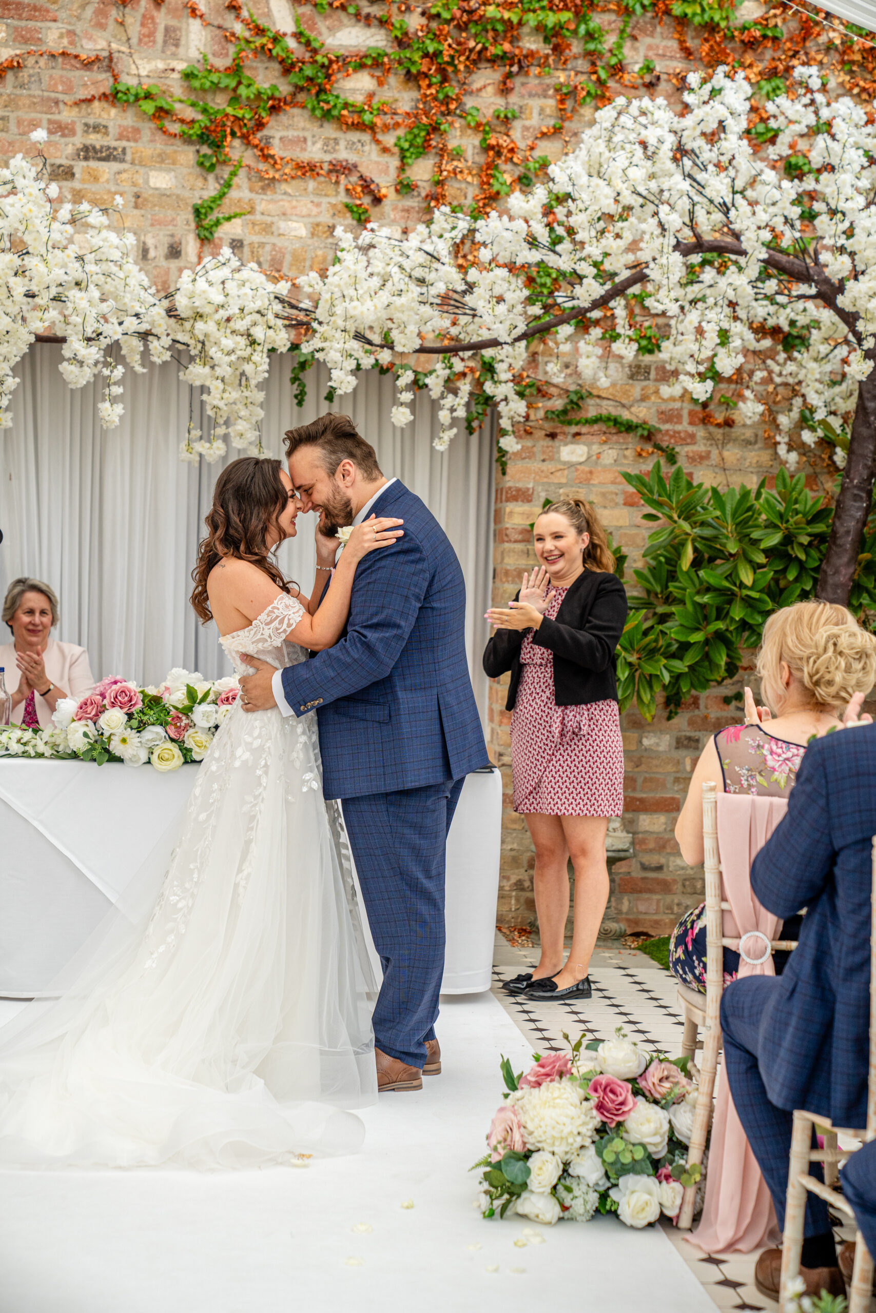 Ceremony in Garden Court in Hanbury Manor wedding venue