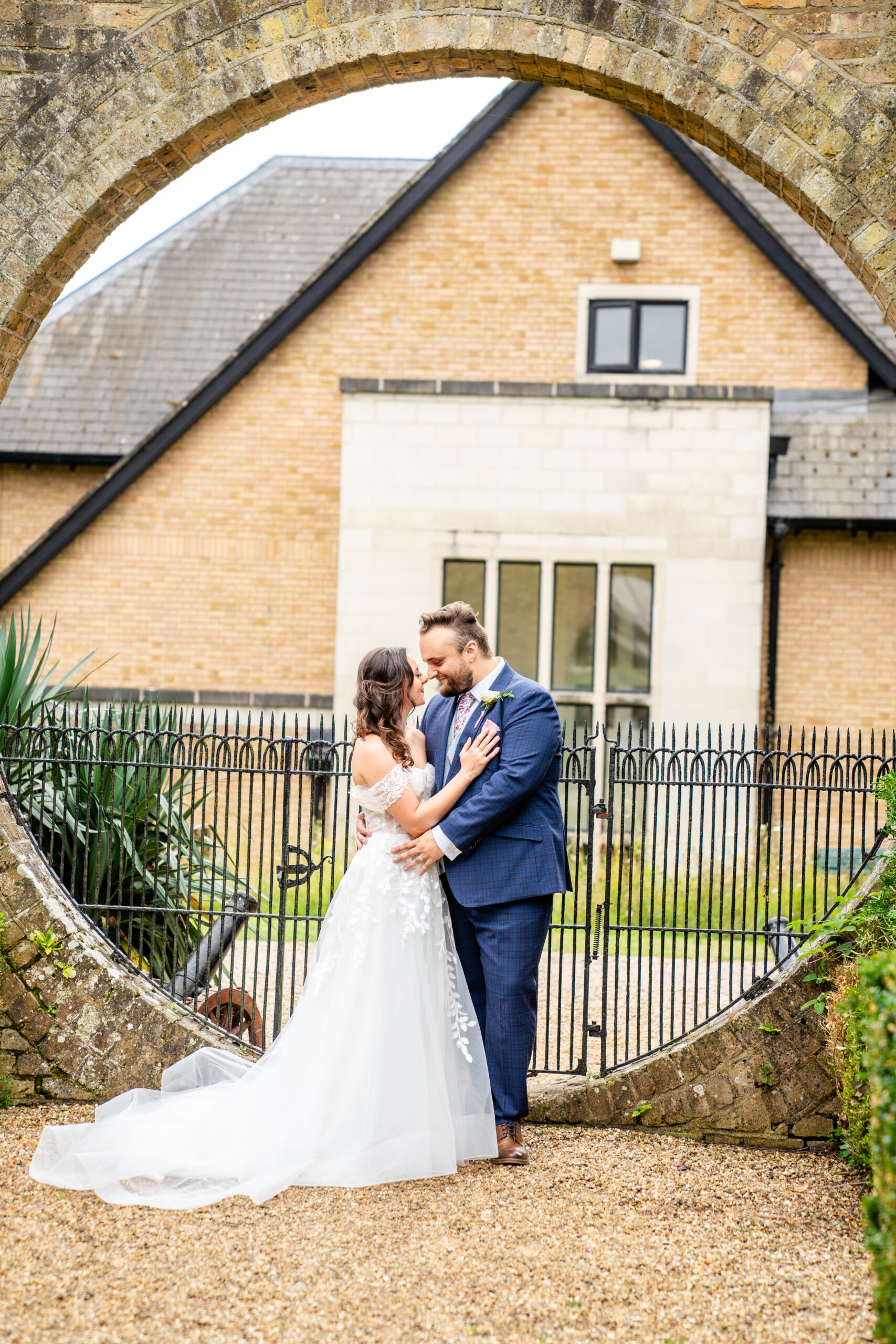 Couple portraits in the grounds of Hanbury Manor wedding venue in Hertfordshire 