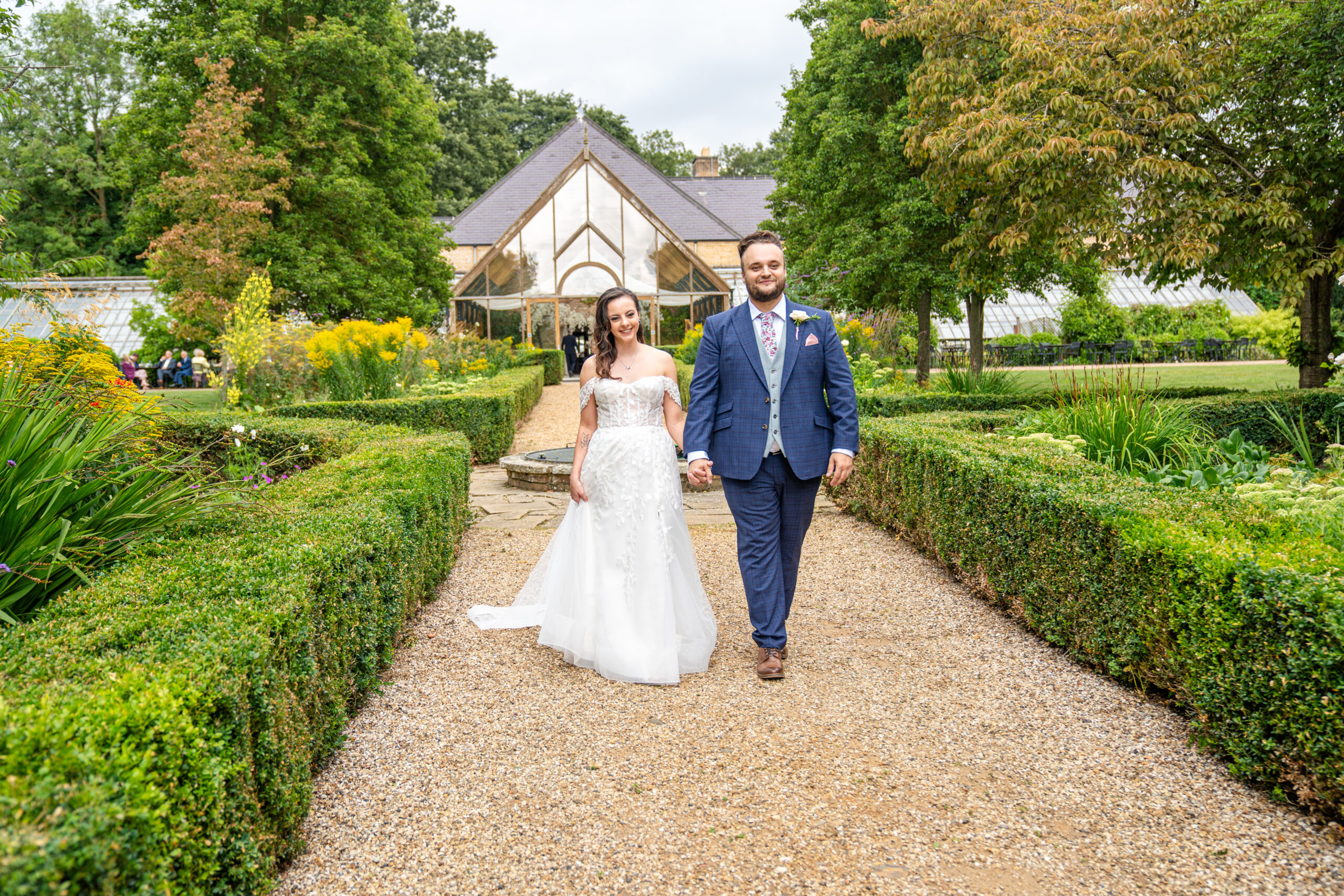 Couple portraits in the grounds of Hanbury Manor wedding venue in Hertfordshire 