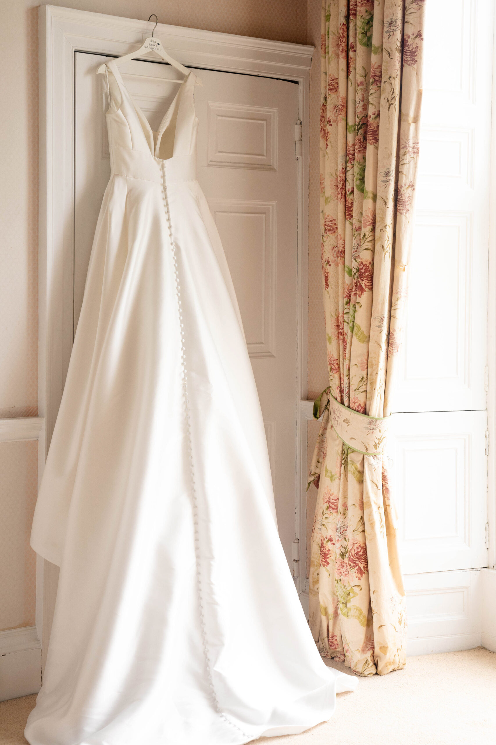 Wedding Dress in the bridal suite of Hooton Pagnell Hall captured by South Yorkshire wedding photographer